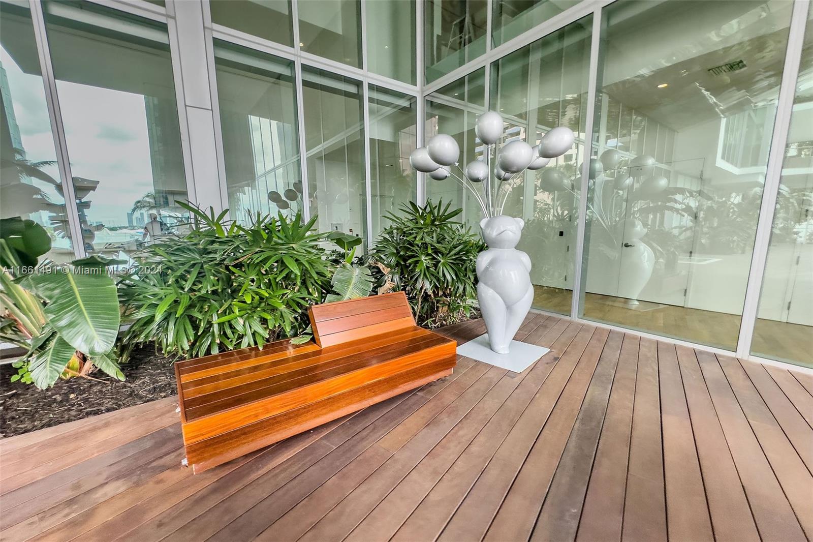 1300 Monad Terrace, Unit 9B Miami Beach, FL 33139 - Photo 31 of 34 a backyard of a house with potted plants