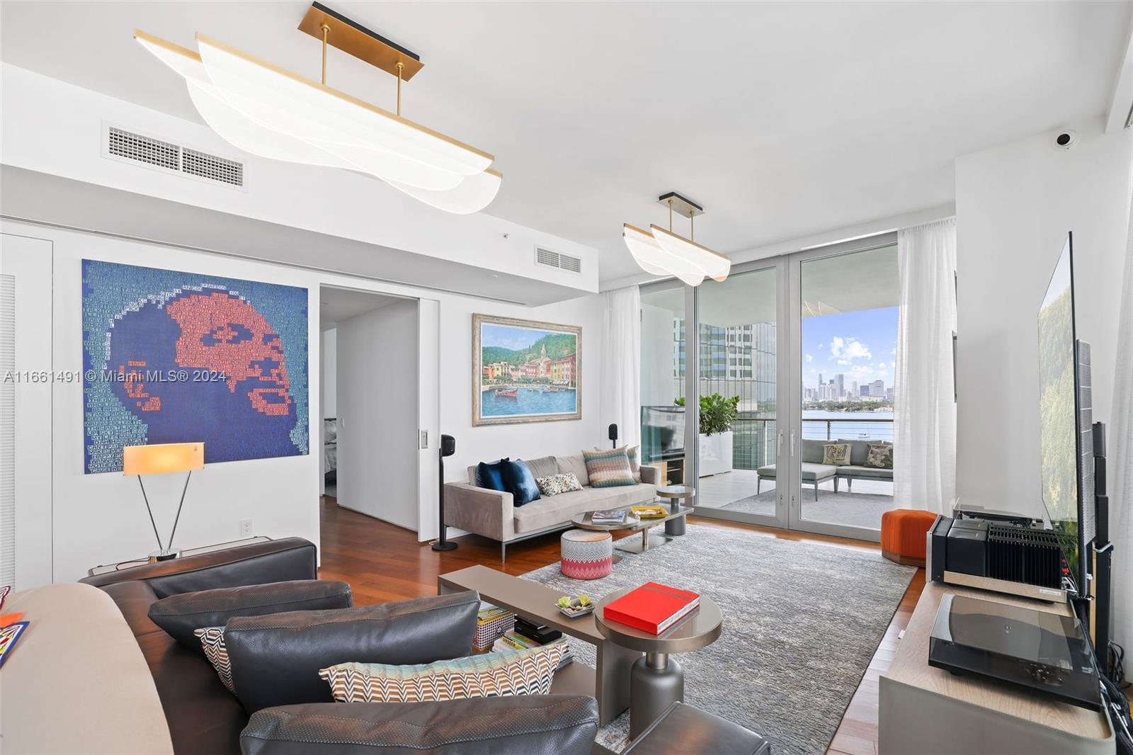 1300 Monad Terrace, Unit 9B Miami Beach, FL 33139 - Photo 5 of 34 a living room with furniture and a large window