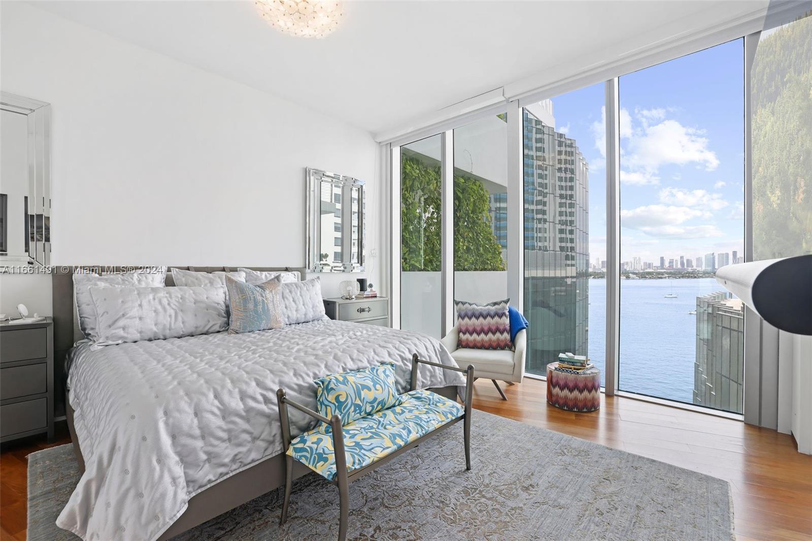 1300 Monad Terrace, Unit 9B Miami Beach, FL 33139 - Photo 7 of 34 a bedroom with a bed and a large window