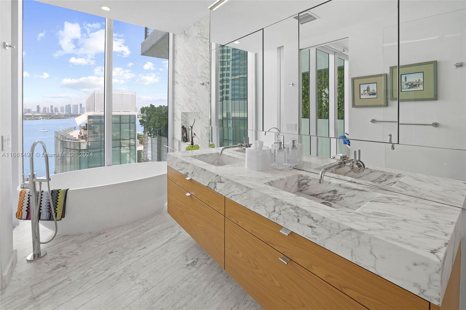 1300 Monad Terrace, Unit 9B Miami Beach, FL 33139 - Photo 8 of 34 a bathroom with sink shower and bathtub