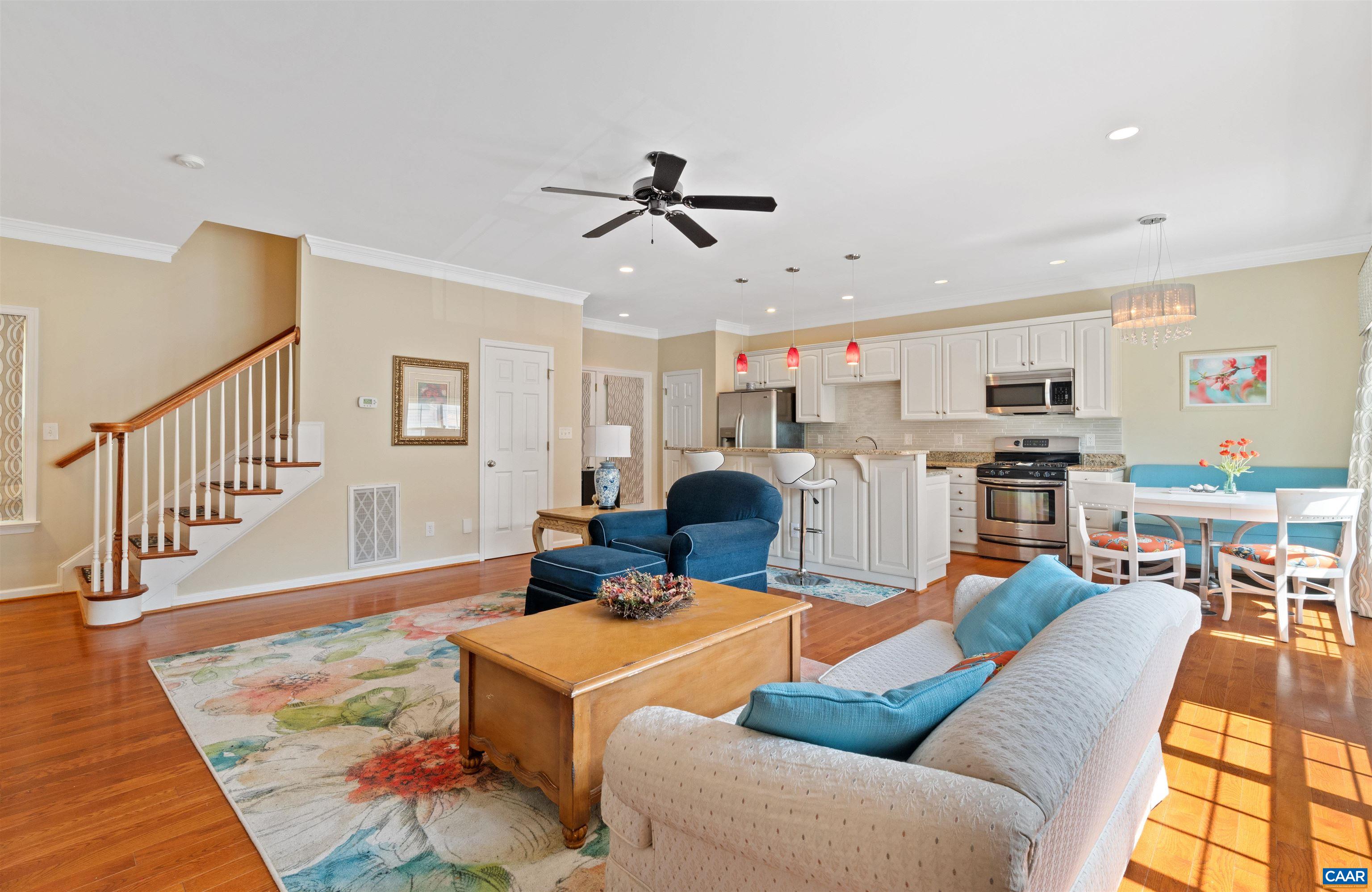 371 Quarry Road Charlottesville, VA 22902 - Photo 1 of 52 a living room with furniture kitchen view and a wooden floor