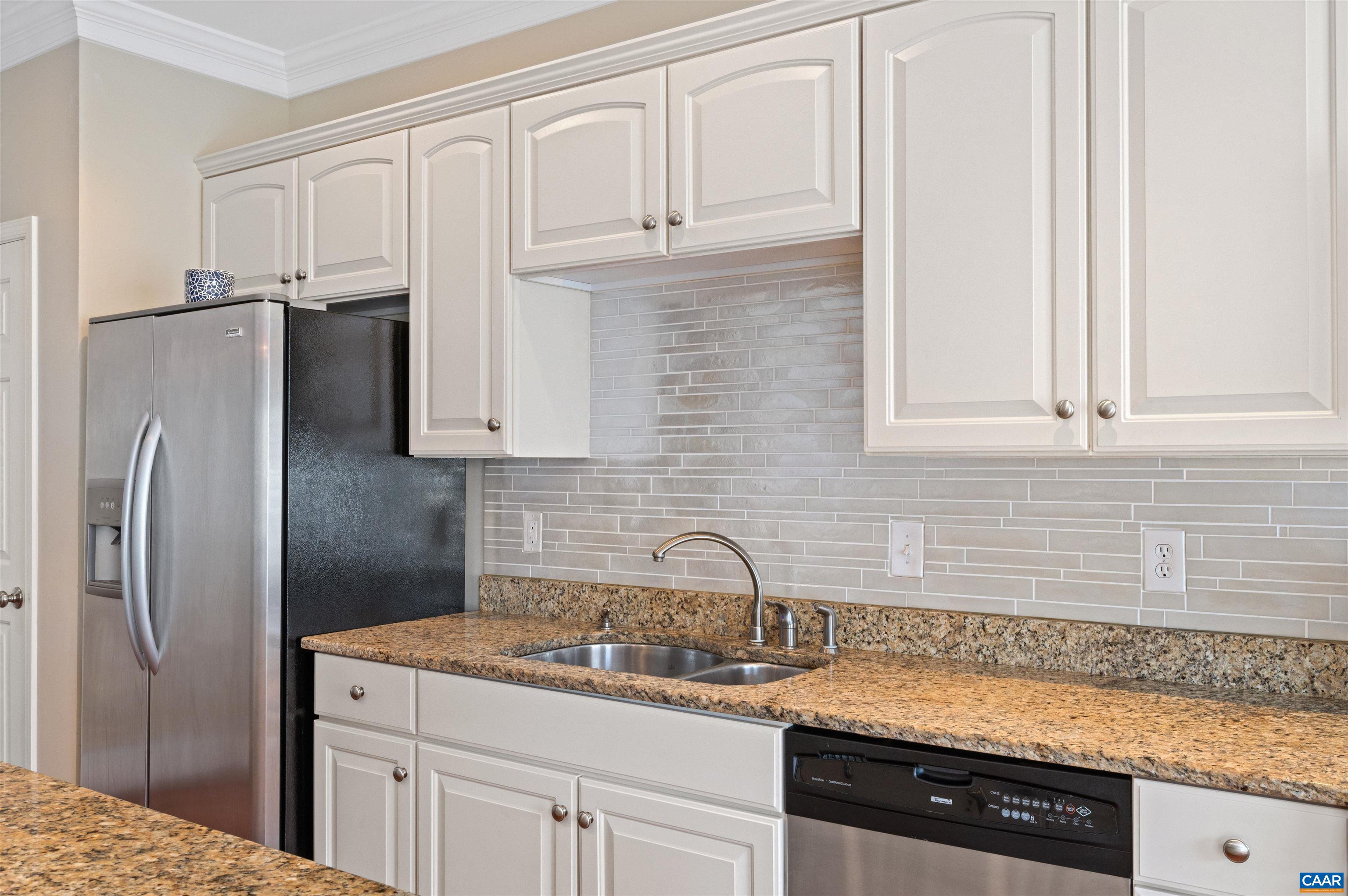 371 Quarry Road Charlottesville, VA 22902 - Photo 12 of 52 a kitchen with granite countertop a sink stainless steel appliances and cabinets