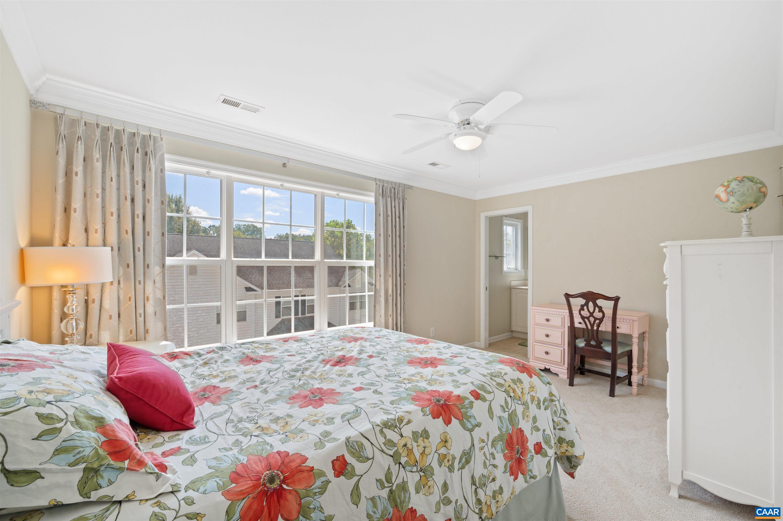 371 Quarry Road Charlottesville, VA 22902 - Photo 19 of 52 a bedroom with a bed and a large window