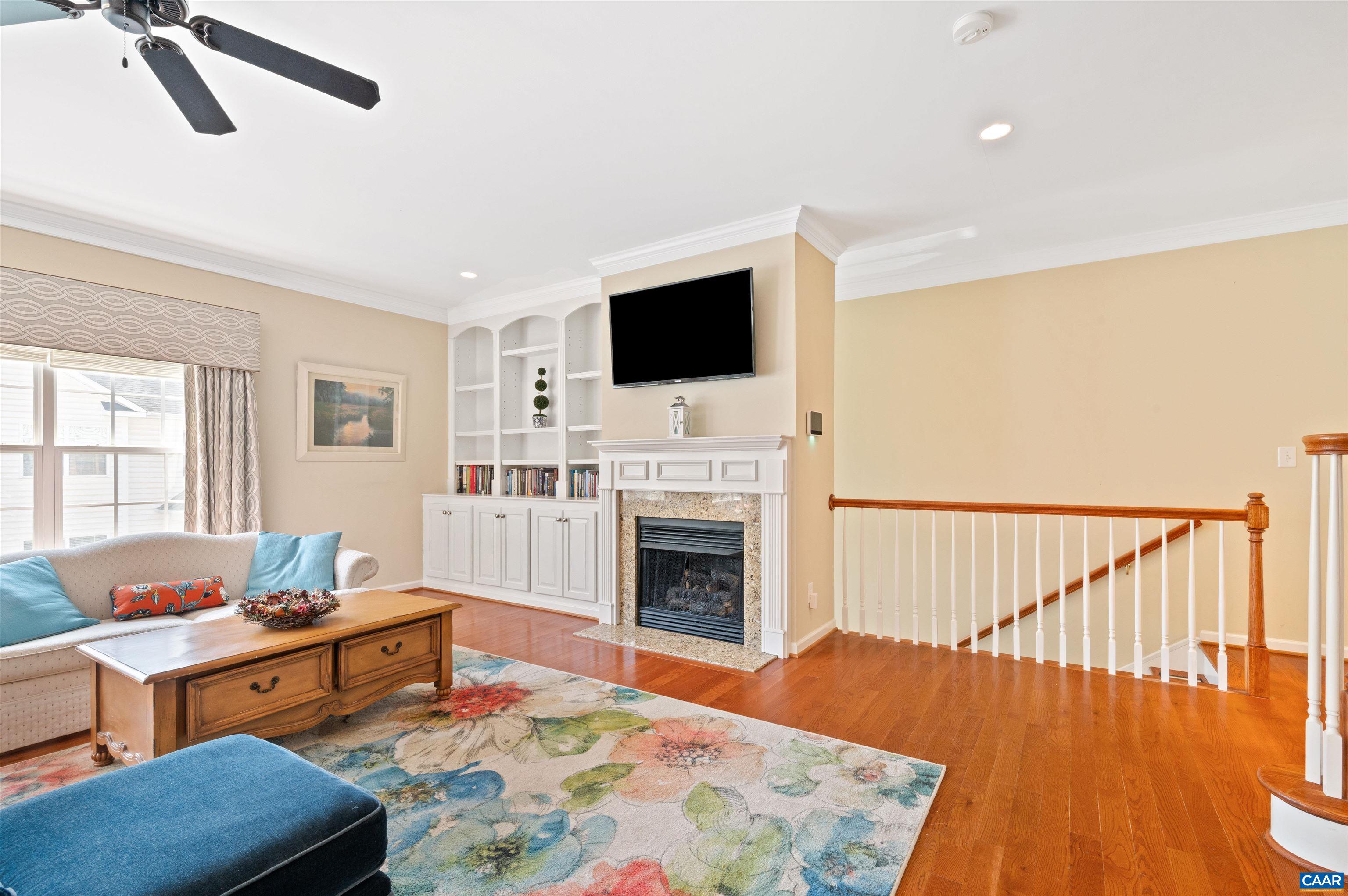 371 Quarry Road Charlottesville, VA 22902 - Photo 5 of 52 a living room with furniture fireplace and flat screen tv