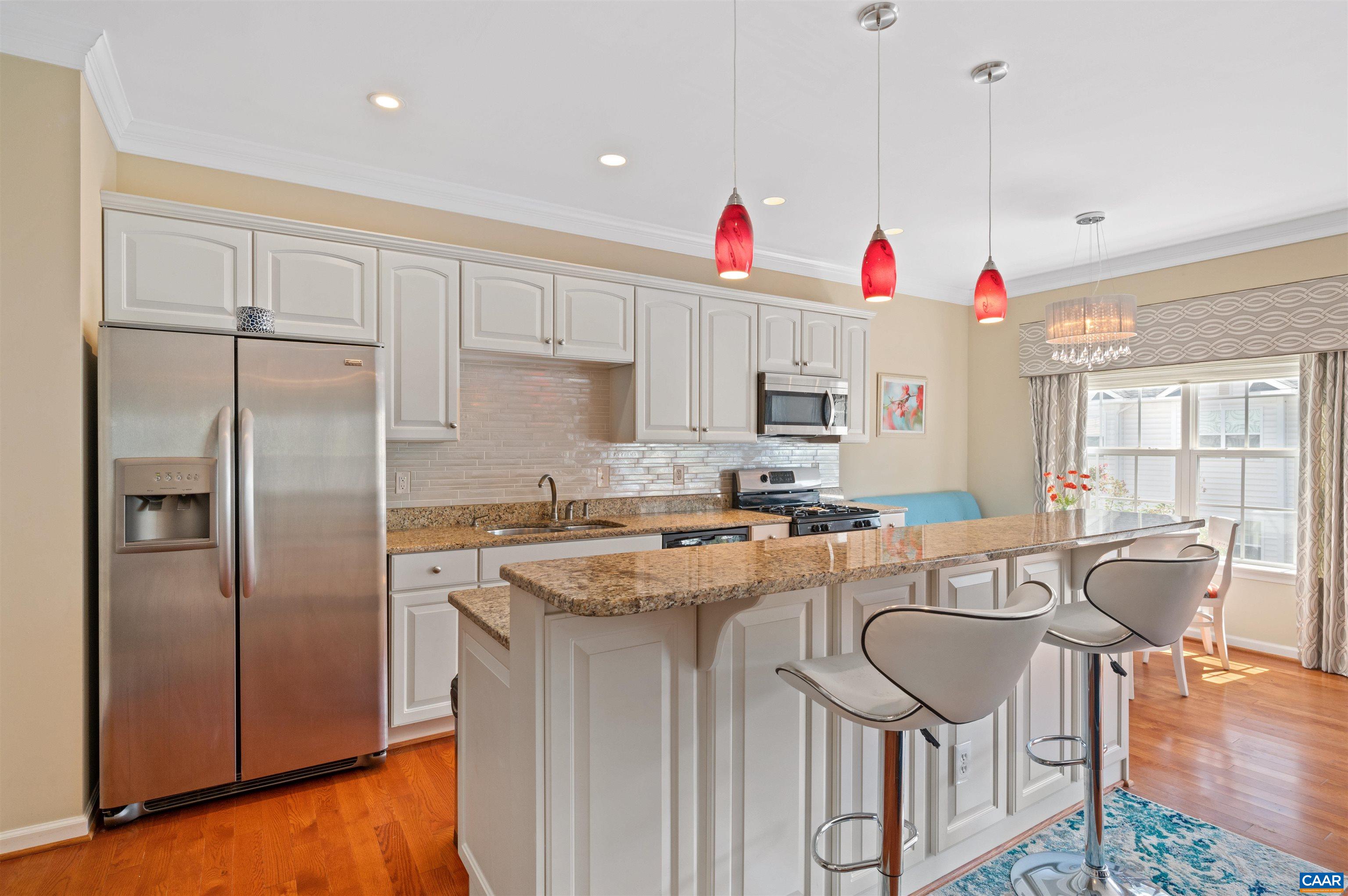 371 Quarry Road Charlottesville, VA 22902 - Photo 6 of 52 a kitchen with stainless steel appliances granite countertop a sink dishwasher a refrigerator and cabinets with wooden floor