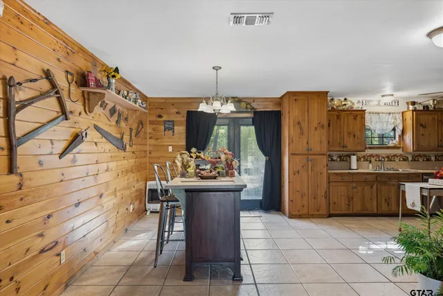a kitchen with a refrigerator and countertop