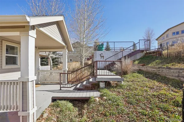 a view of a swimming pool with an outdoor seating