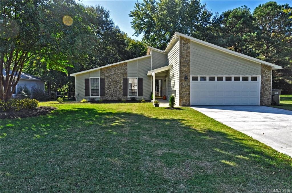 9924 Fairway Ridge Road Charlotte, NC 28277 - Photo 1 of 21 a front view of house with yard and outdoor seating