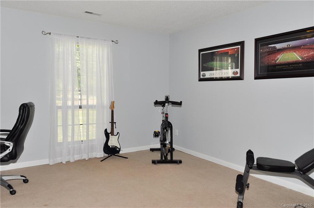 9924 Fairway Ridge Road Charlotte, NC 28277 - Photo 13 of 21 a view of a room with gym equipment