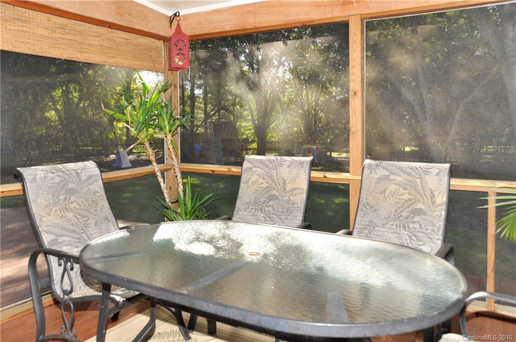 9924 Fairway Ridge Road Charlotte, NC 28277 - Photo 15 of 21 a view of a dining room with furniture window and outside view