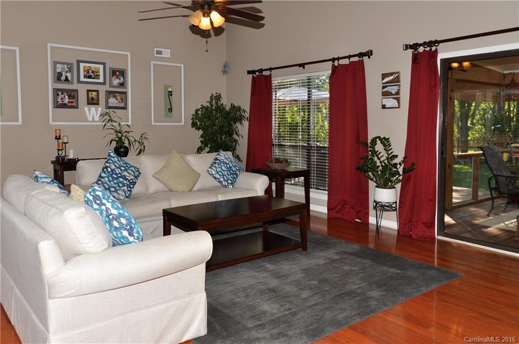9924 Fairway Ridge Road Charlotte, NC 28277 - Photo 9 of 21 a living room with furniture and a large window