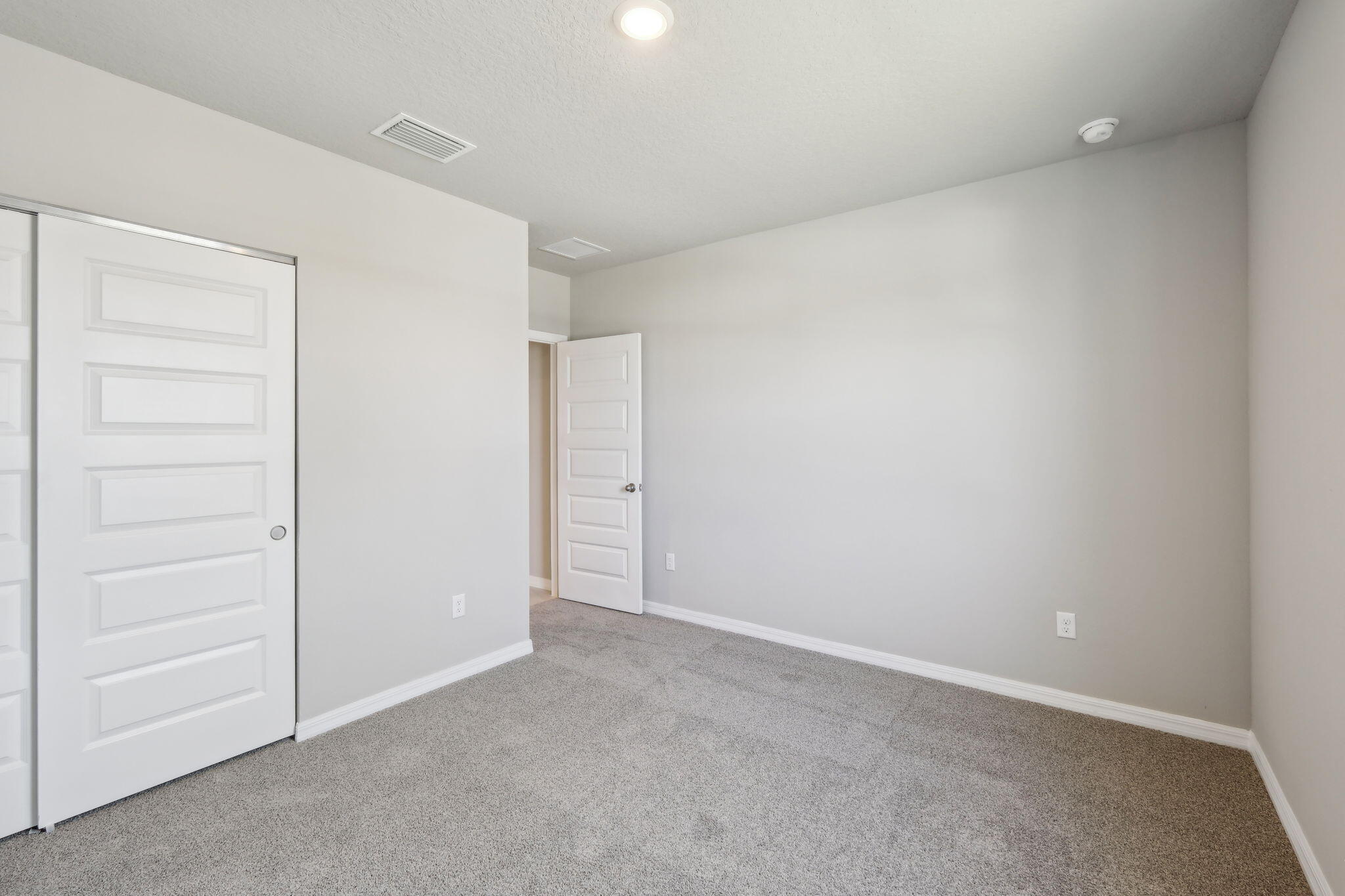 5413 Hampton Park Circle Vero Beach, FL 32966 - Photo 16 of 39 a view of an empty room