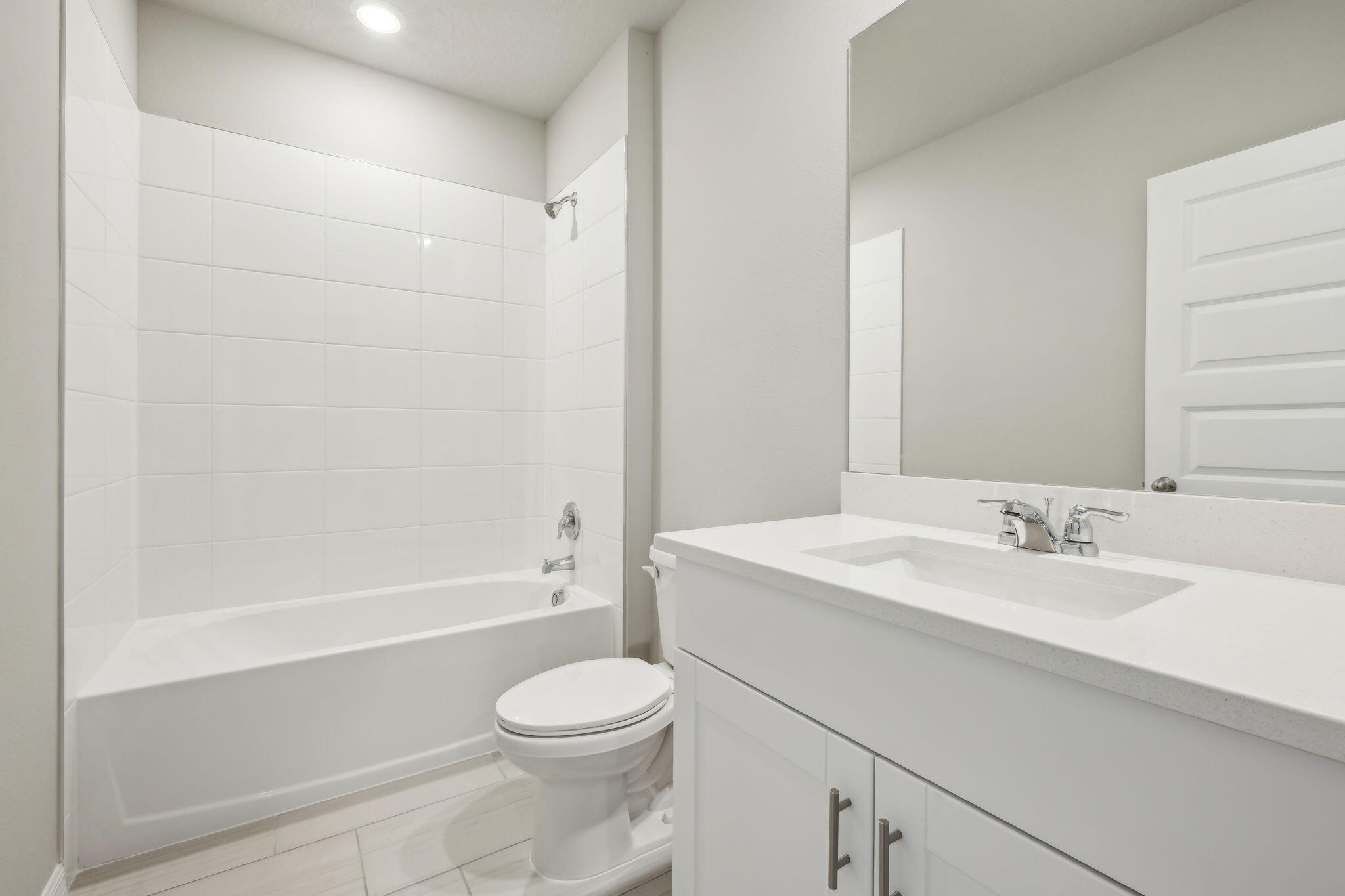 5413 Hampton Park Circle Vero Beach, FL 32966 - Photo 17 of 39 a bathroom with a sink a toilet and bathtub