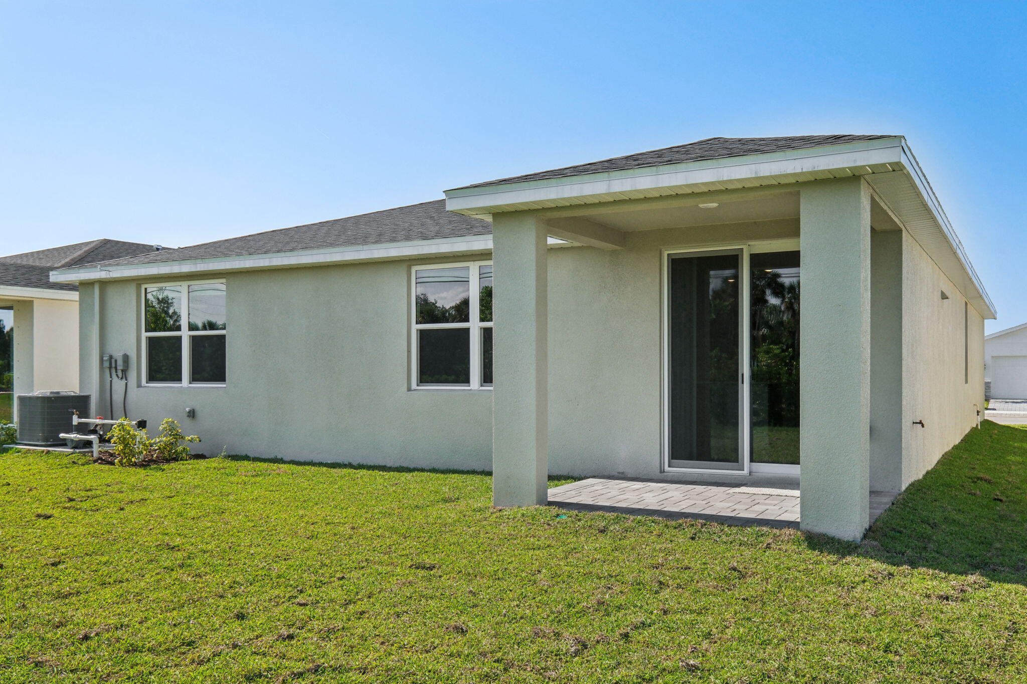 5413 Hampton Park Circle Vero Beach, FL 32966 - Photo 34 of 39 a view of an house with backyard space