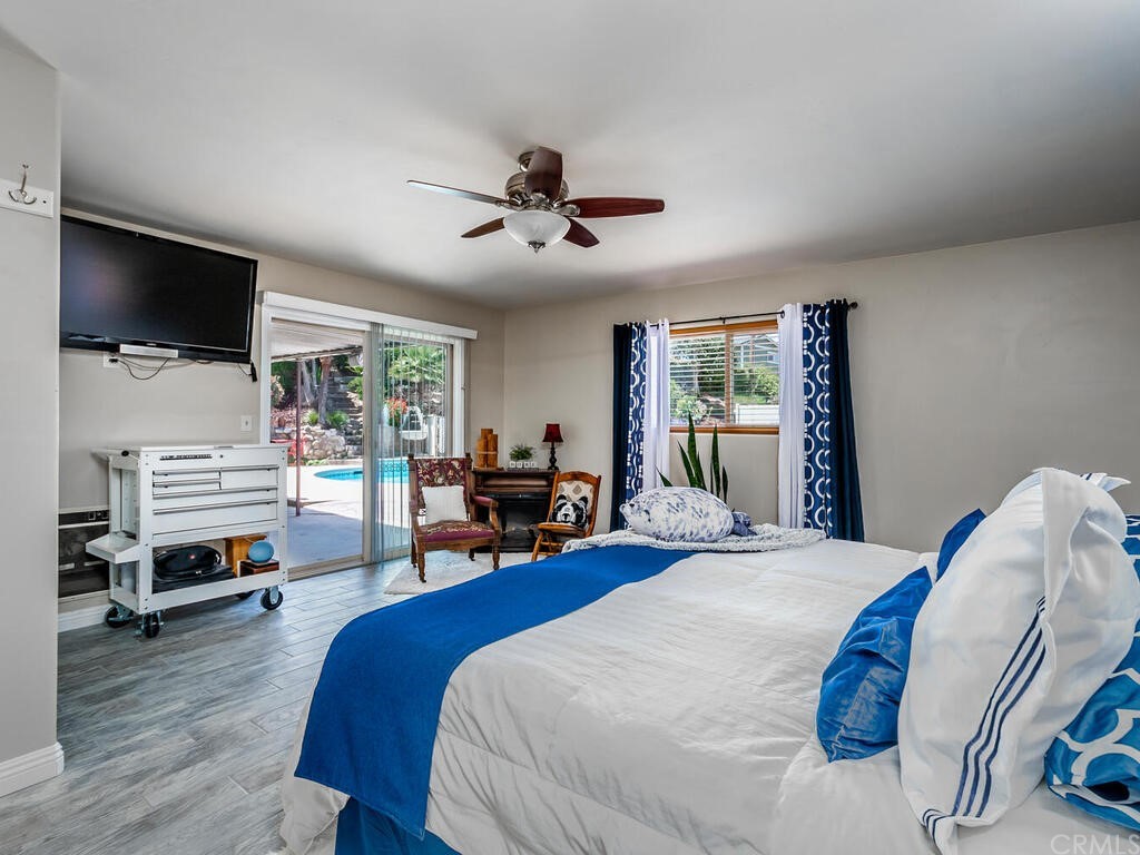 1286 Via Pavion Santa Maria, CA 93455 - Photo 14 of 38 a bedroom with furniture and a flat screen tv