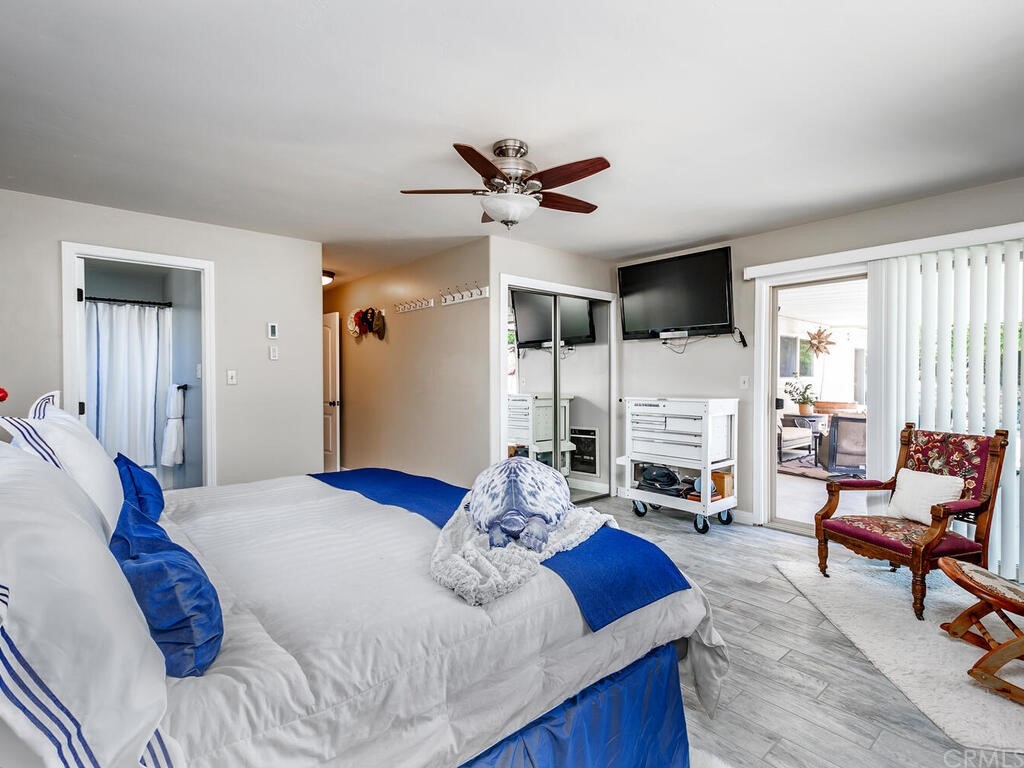 1286 Via Pavion Santa Maria, CA 93455 - Photo 15 of 38 a bedroom with furniture and a large window