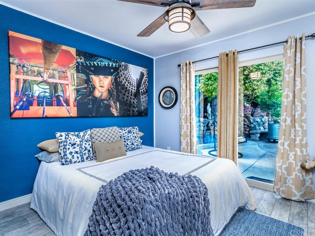 1286 Via Pavion Santa Maria, CA 93455 - Photo 20 of 38 a bedroom with a bed and a large window