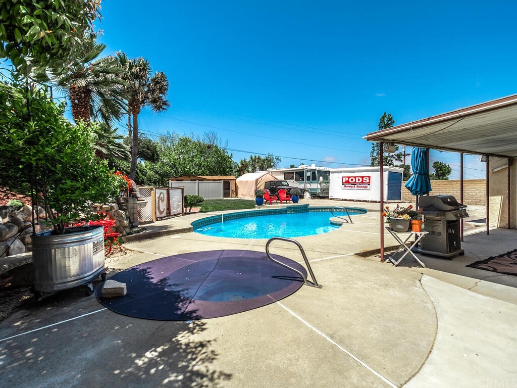 1286 Via Pavion Santa Maria, CA 93455 - Photo 25 of 38 a building outdoor space with furniture and potted plants