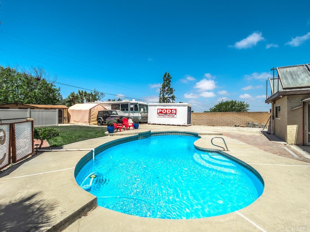 1286 Via Pavion Santa Maria, CA 93455 - Photo 27 of 38 a view of a swimming pool with a yard