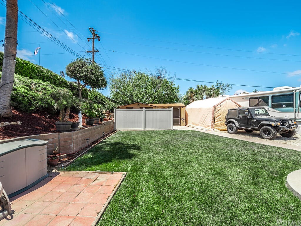 1286 Via Pavion Santa Maria, CA 93455 - Photo 28 of 38 a front view of a house with garden