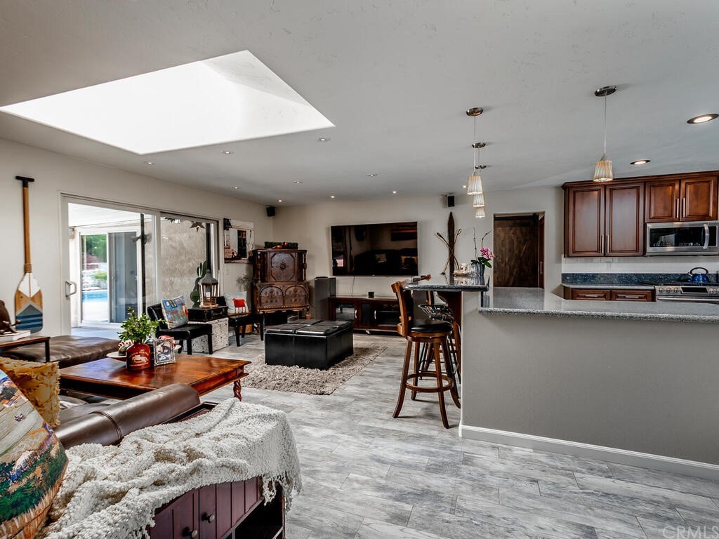 1286 Via Pavion Santa Maria, CA 93455 - Photo 4 of 38 a living room with fireplace furniture and a flat screen tv