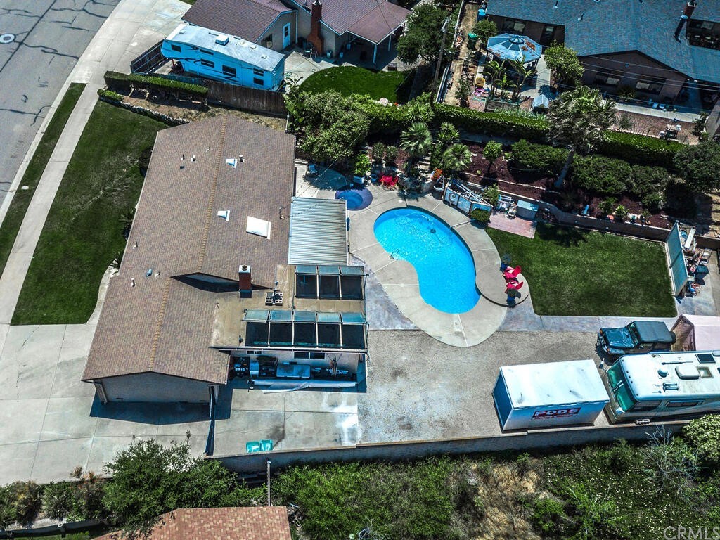 1286 Via Pavion Santa Maria, CA 93455 - Photo 38 of 38 an aerial view of a house with a swimming pool a yard and outdoor seating