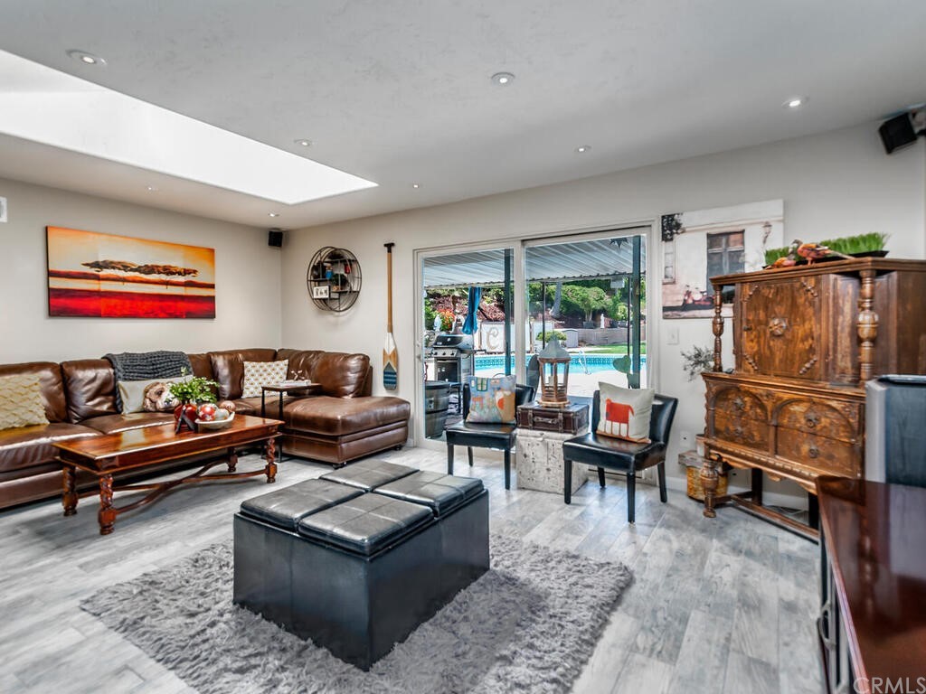 1286 Via Pavion Santa Maria, CA 93455 - Photo 6 of 38 a living room with furniture a rug and a window