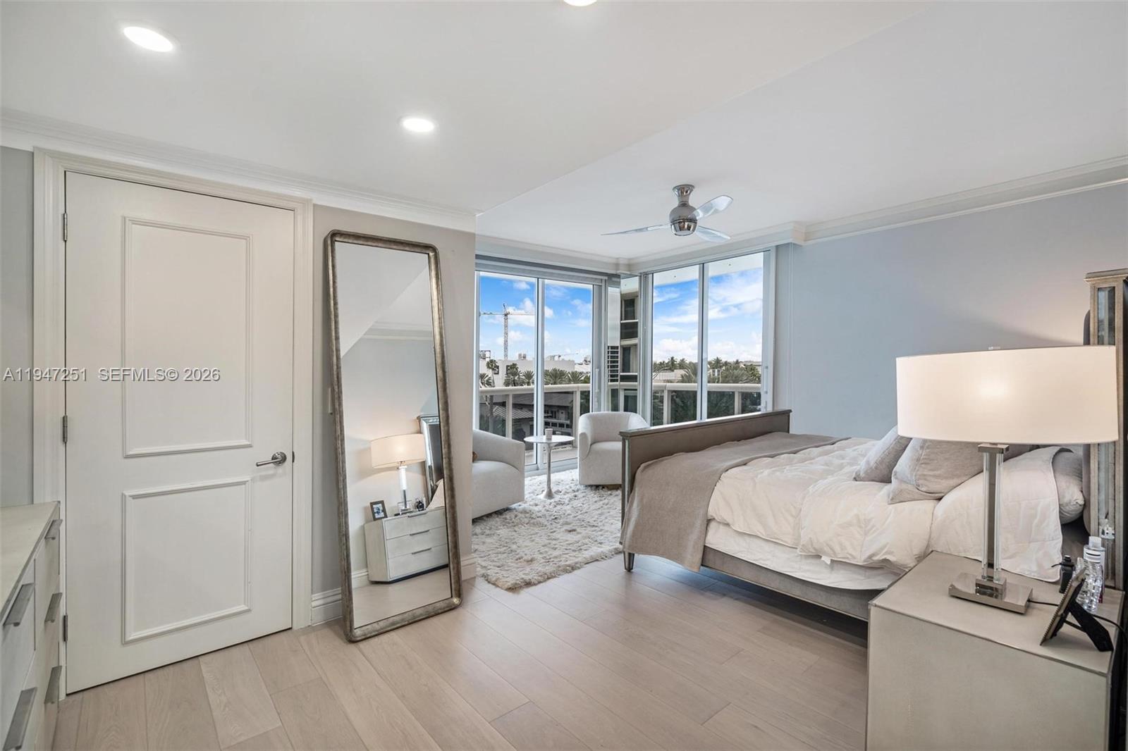 9559 Collins Avenue, Unit S4E Surfside, FL 33154 - Photo 15 of 37 a bed room with a bed and a window