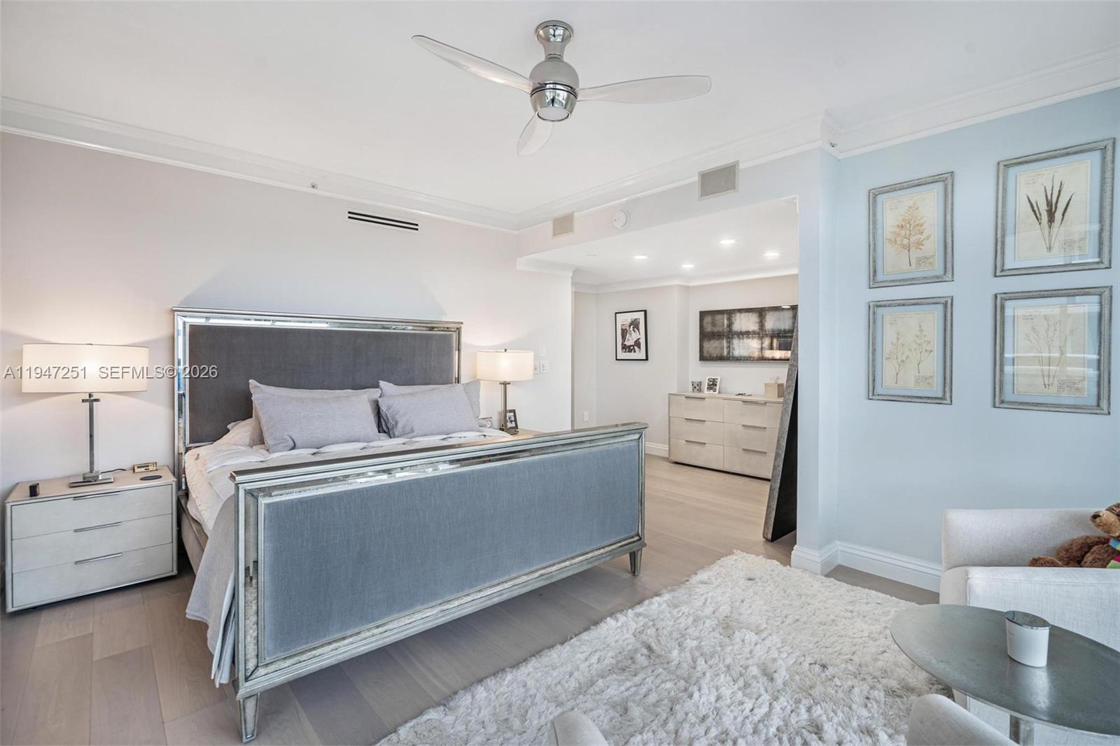 9559 Collins Avenue, Unit S4E Surfside, FL 33154 - Photo 20 of 37 a living room with a bed and a window