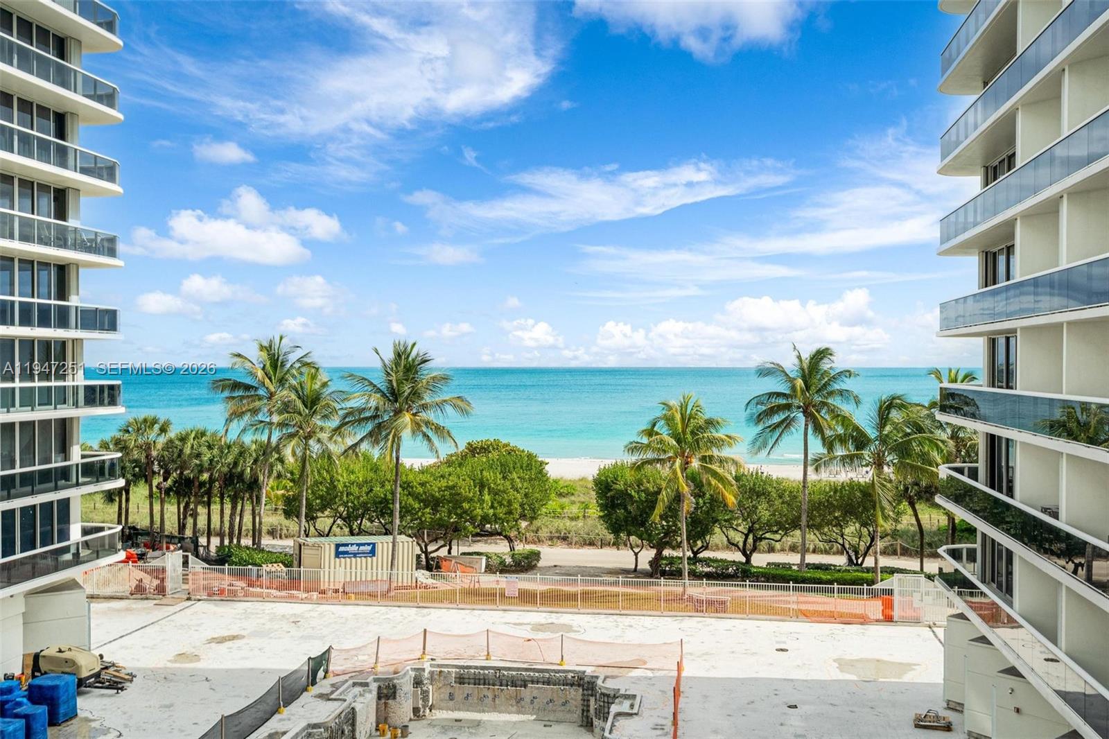 9559 Collins Avenue, Unit S4E Surfside, FL 33154 - Photo 37 of 37 a view of a palm tree with flower plants