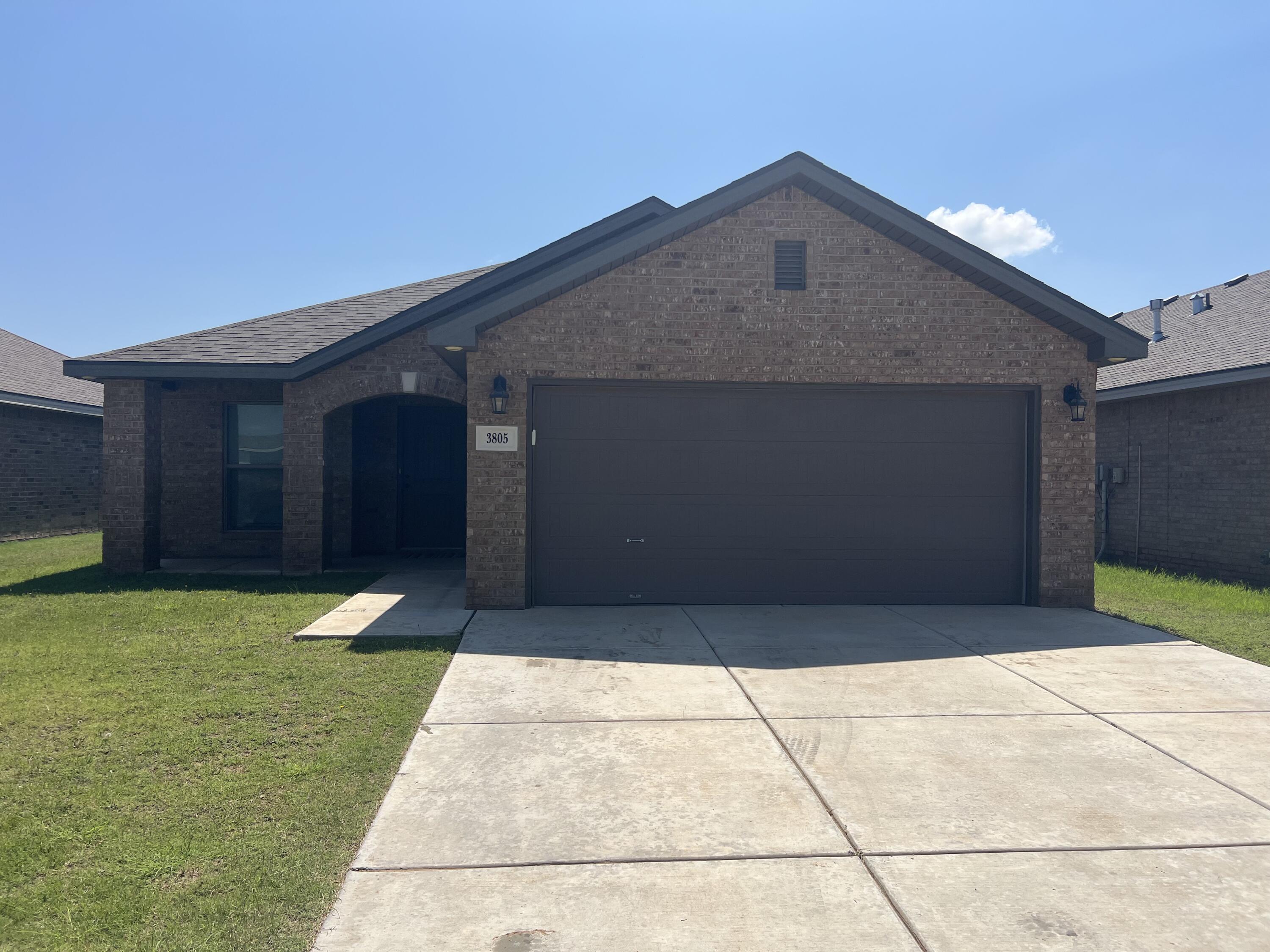 a front view of house with yard