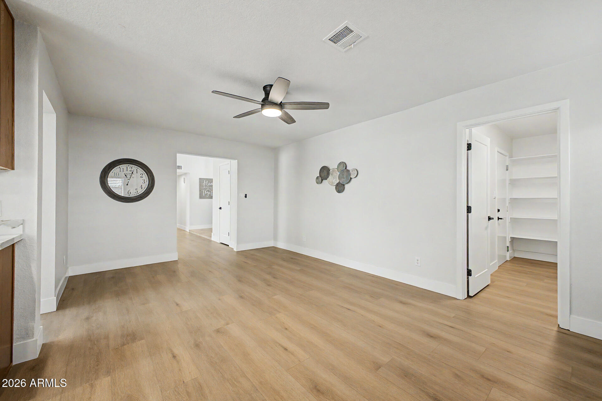 1009 West Pampa Avenue Mesa, AZ 85210 - Photo 11 of 31 a view of empty room with wooden floor