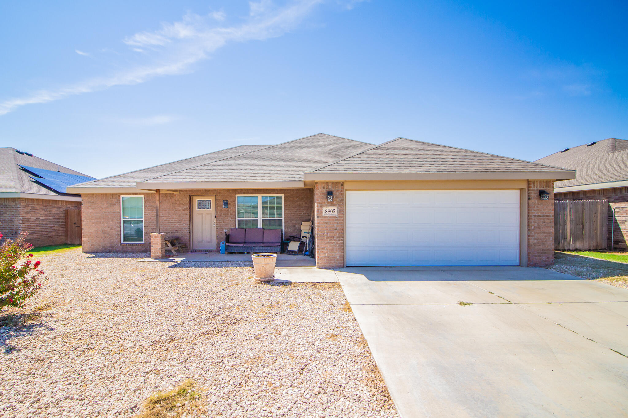 a front view of a house with a patio