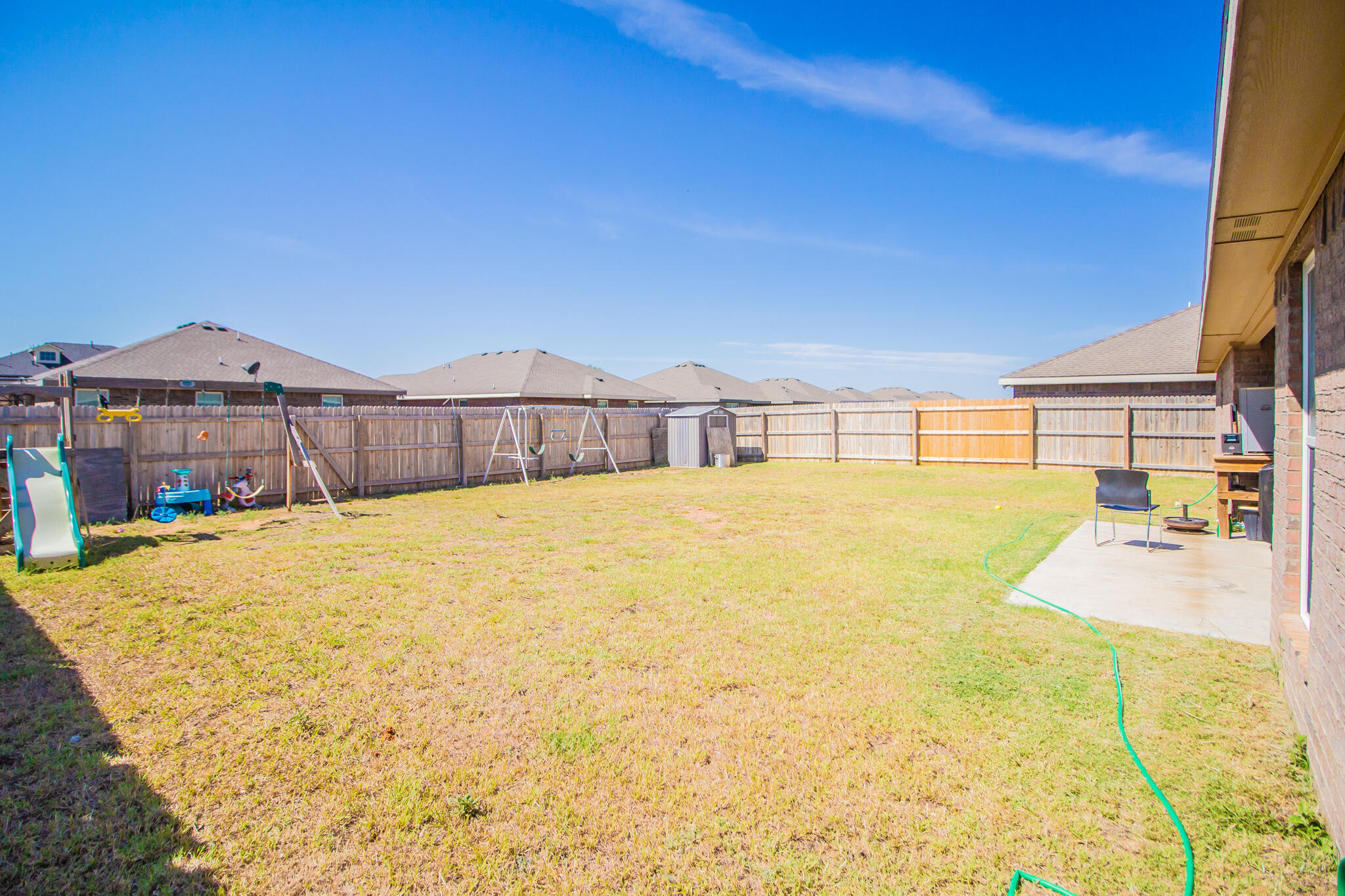 8805 15th Street Lubbock, TX 79416 - Photo 18 of 20 a swimming pool with trees in the background