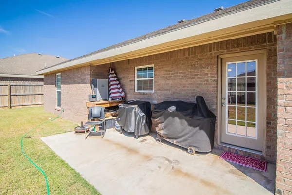 a view of a house with a patio