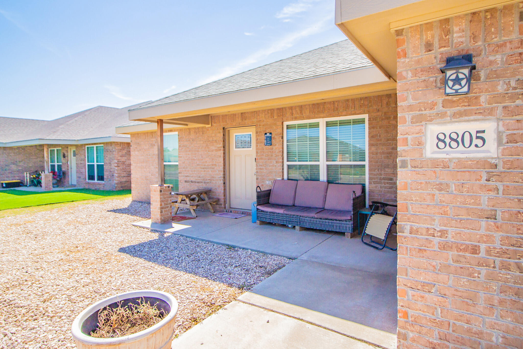8805 15th Street Lubbock, TX 79416 - Photo 2 of 20 a living room with furniture and a rug