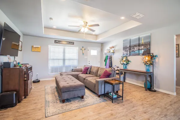 a bedroom with furniture and window