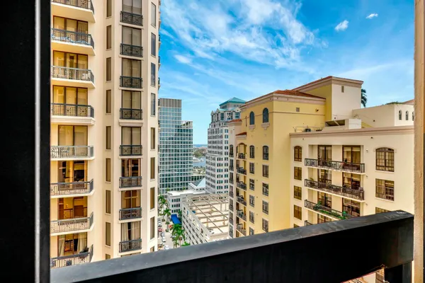 a front view of a building with a lot of windows