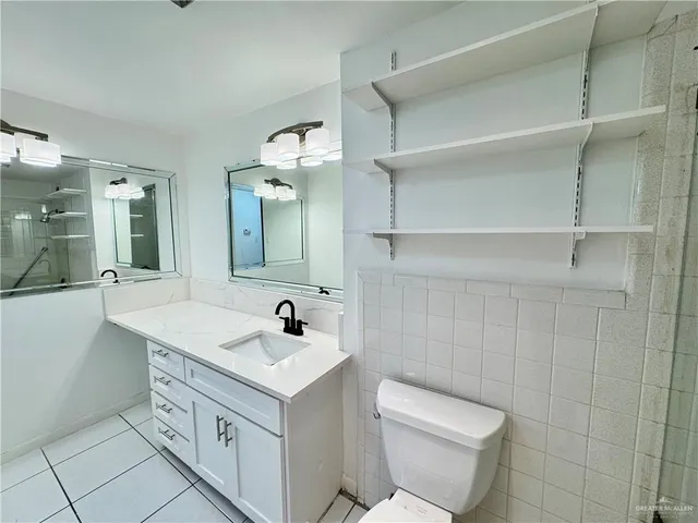 a bathroom with a sink and a toilet