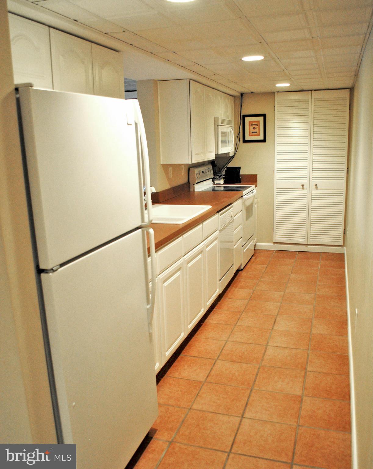 10 Farm Ridge Court Baldwin, MD 21013 - Photo 22 of 29 a kitchen with stainless steel appliances a refrigerator and a sink