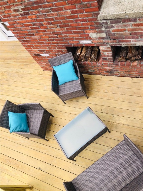 123 Lapham Farm Road Burrillville, RI 02859 - Photo 16 of 40 This deck space only needs a chiminea and you!
