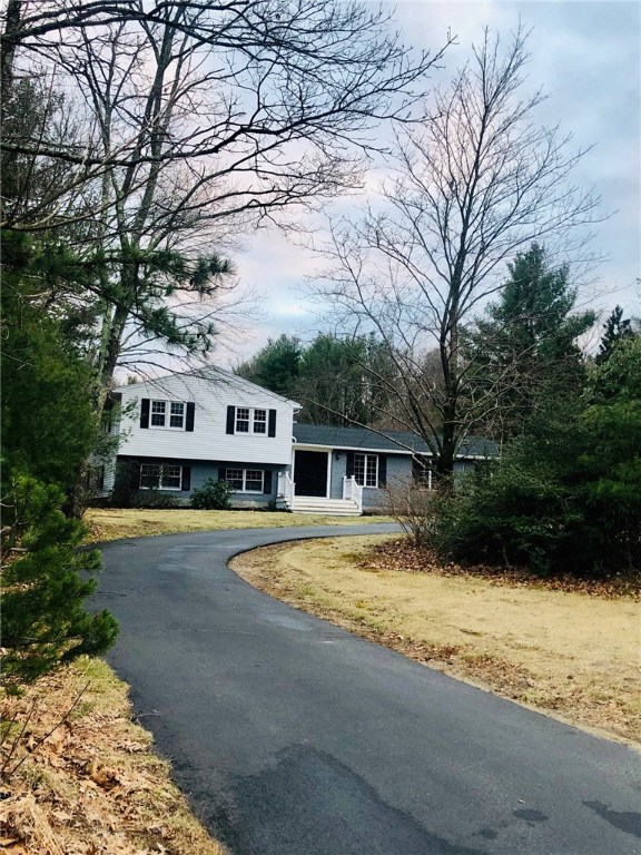 123 Lapham Farm Road Burrillville, RI 02859 - Photo 2 of 40 Private off the road home with a convenient paved circular driveway and center island