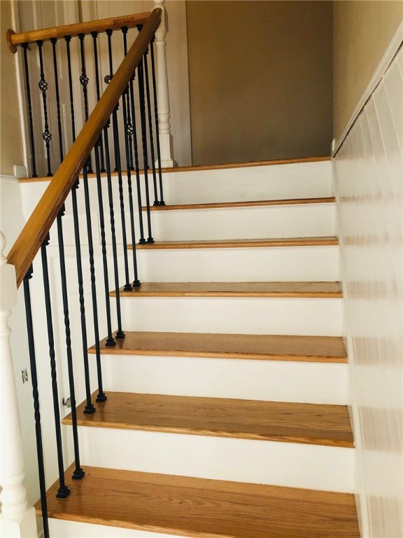 123 Lapham Farm Road Burrillville, RI 02859 - Photo 21 of 40 Wrought iron staircase leads you to the second floor