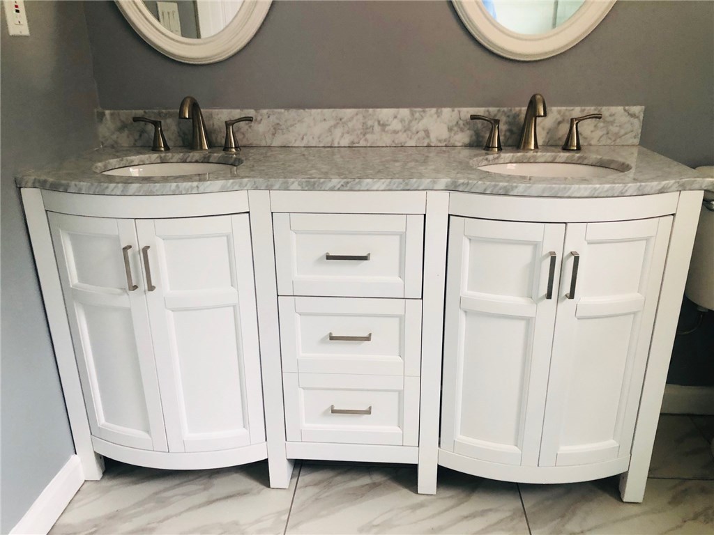 123 Lapham Farm Road Burrillville, RI 02859 - Photo 30 of 40 Master bathroom offers a large vanity with double sinks and marble counter tops.