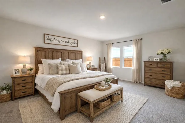 a spacious bedroom with a bed and a closet