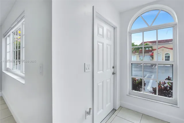 an empty room with windows