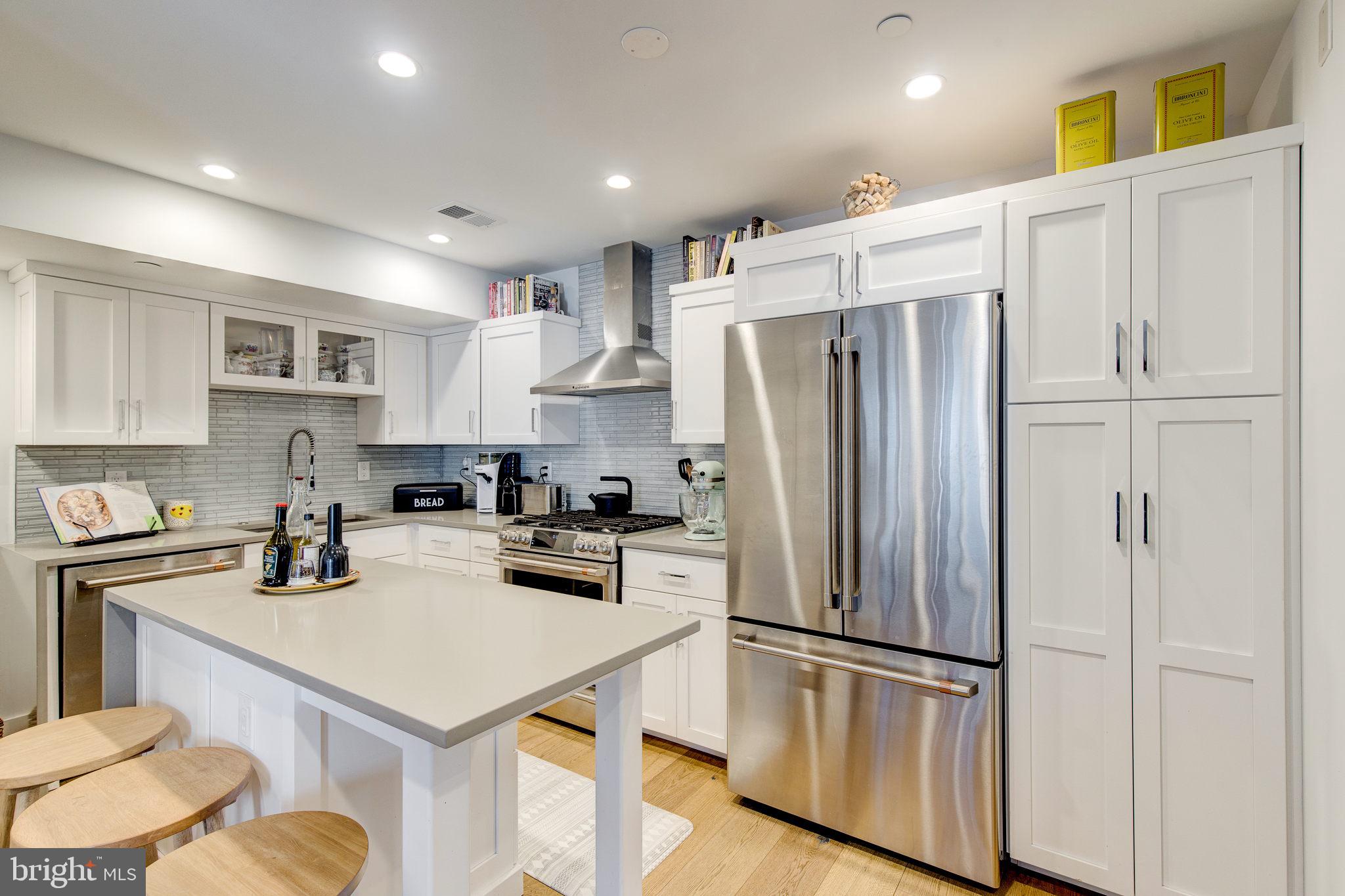 212 Bainbridge Street, Unit 4 Philadelphia, PA 19147 - Photo 1 of 27 Kitchen with bar seating for 3