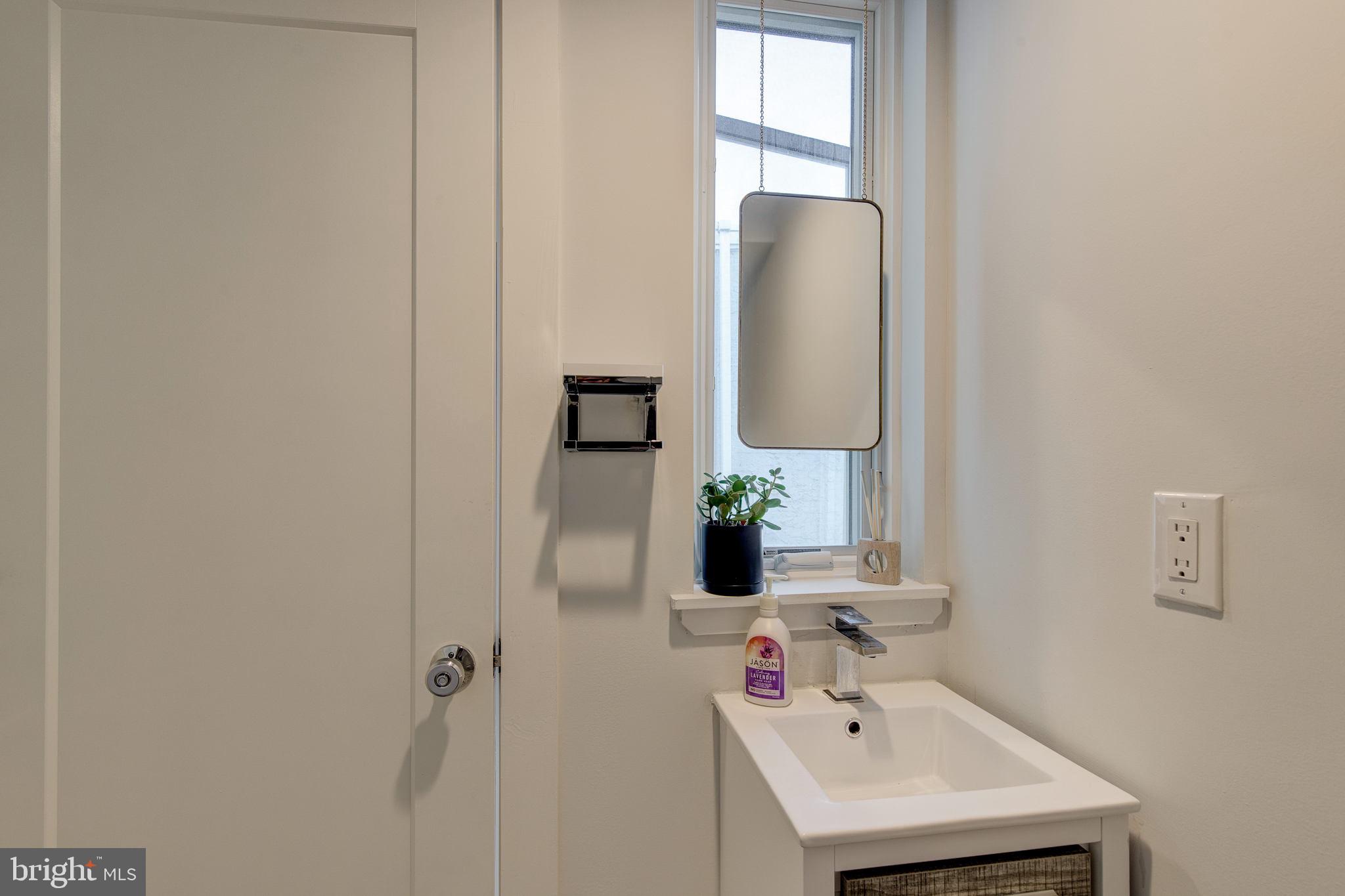212 Bainbridge Street, Unit 4 Philadelphia, PA 19147 - Photo 15 of 27 Half bathroom