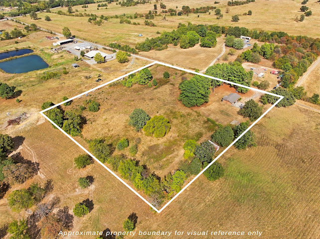 30063 South 4300th Road Stigler, OK 74462 - Photo 50 of 58 Expansive rural land featuring a single-story structure and scattered mature trees