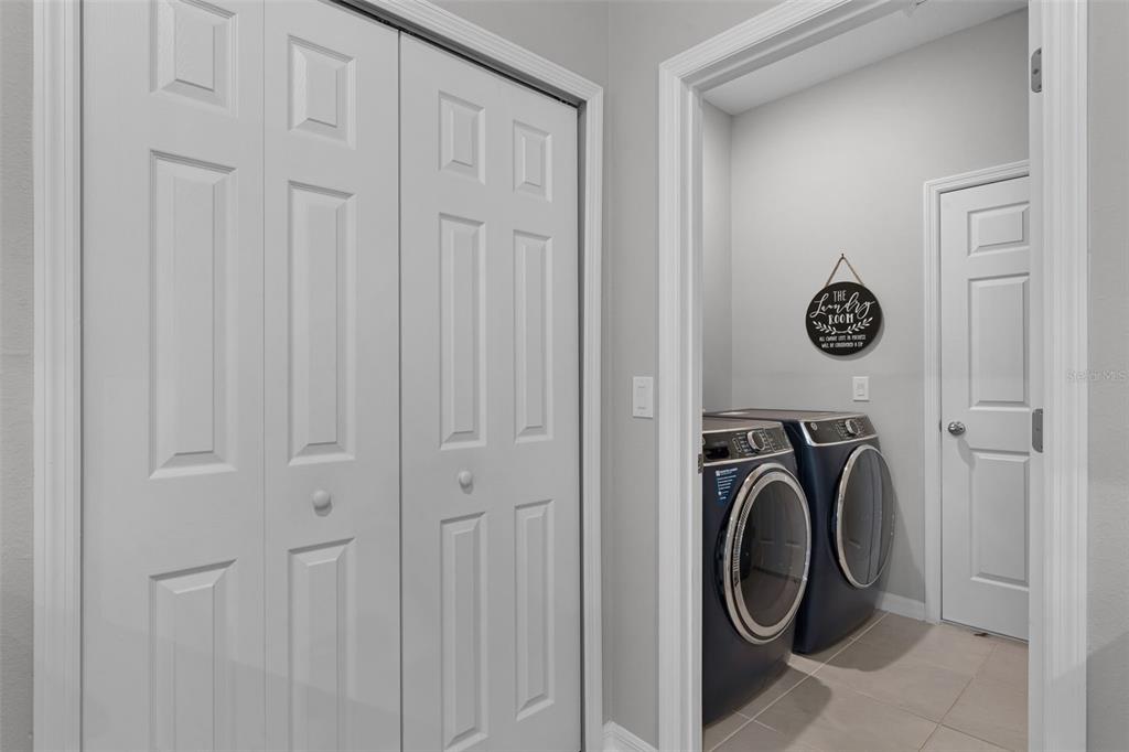 2286 Huntsman Rdg Road Minneola, FL 34715 - Photo 11 of 35 a utility room with dryer and washer